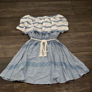 This dress is a cute strapless beach dress that has never been worn.